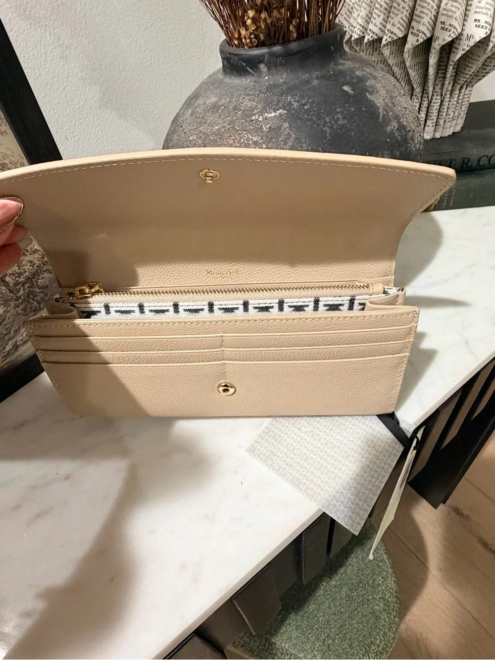 Moncrieff Beige Pebbled Leather Clutch